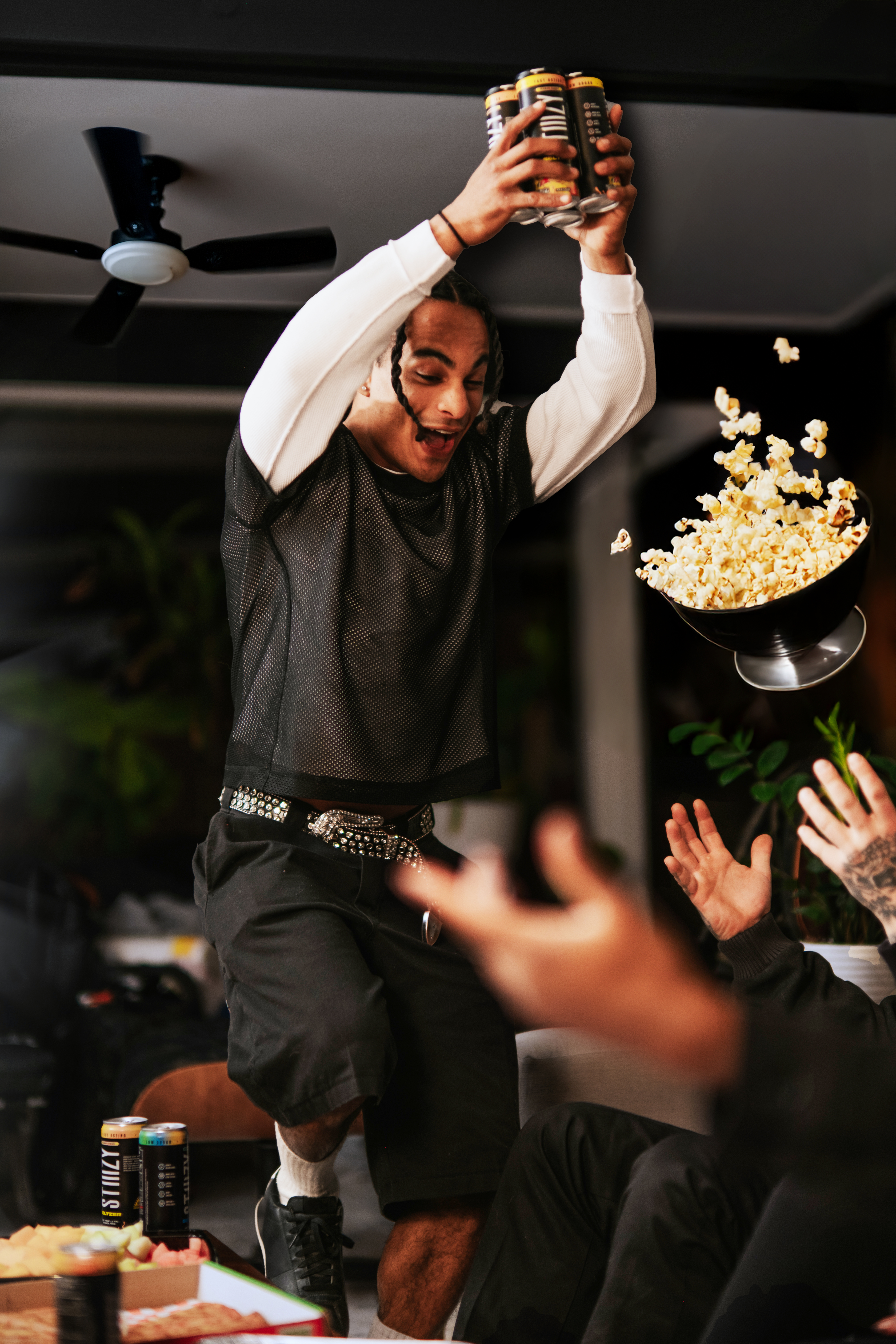 Approved STIIIZY Drinks game-night photograph with popcorn and friends