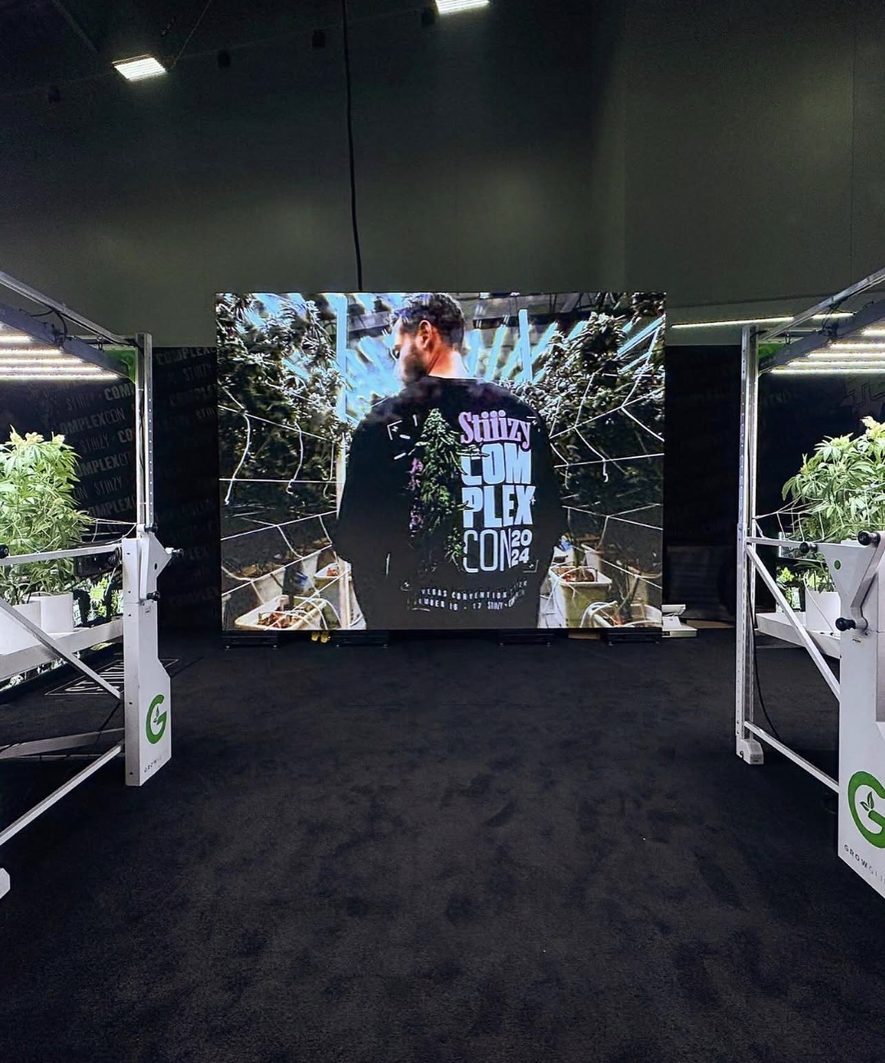 ComplexCon installation with large campaign screen and display structures