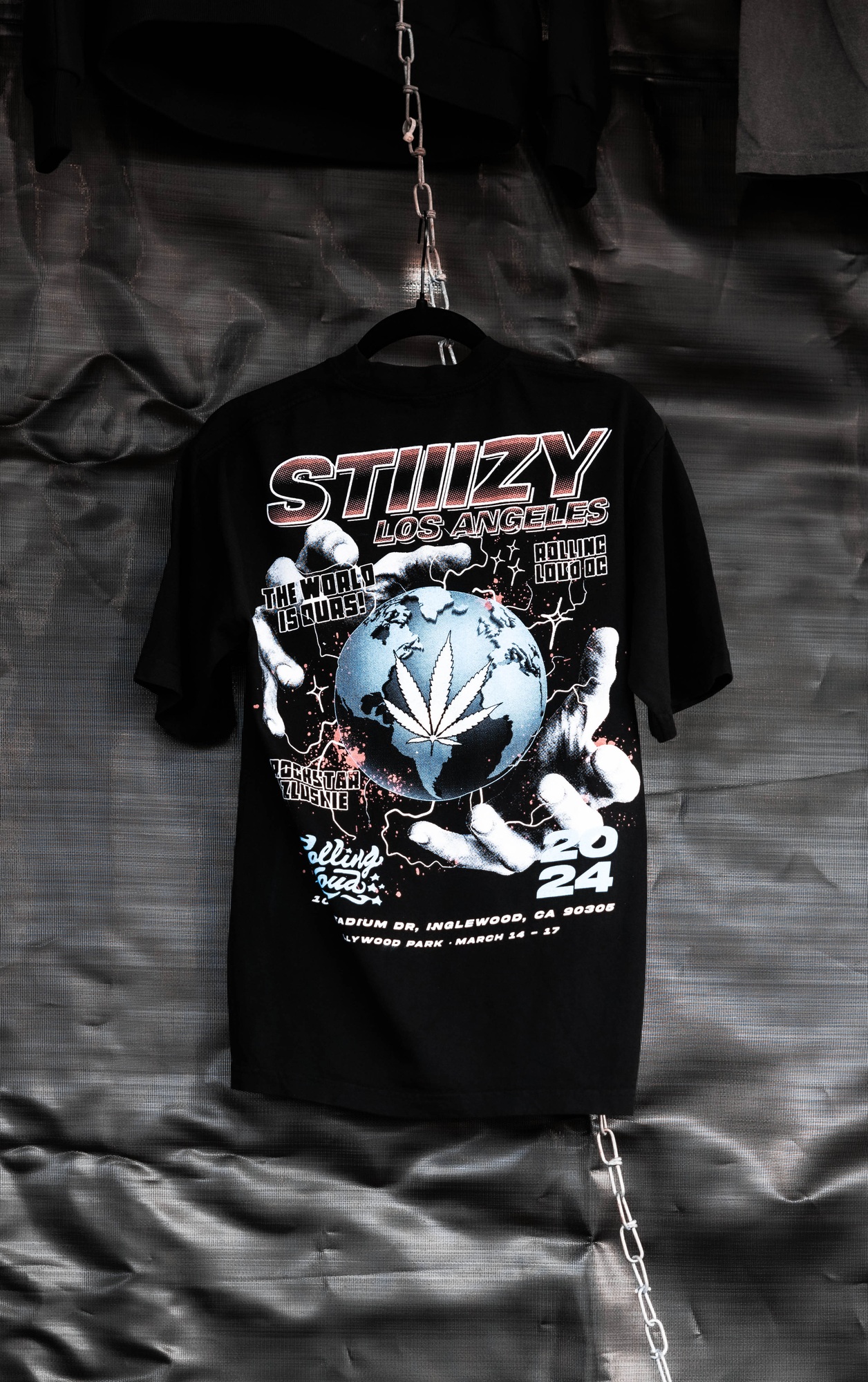 Complete 2024 Rolling Loud tee photographed on the ground