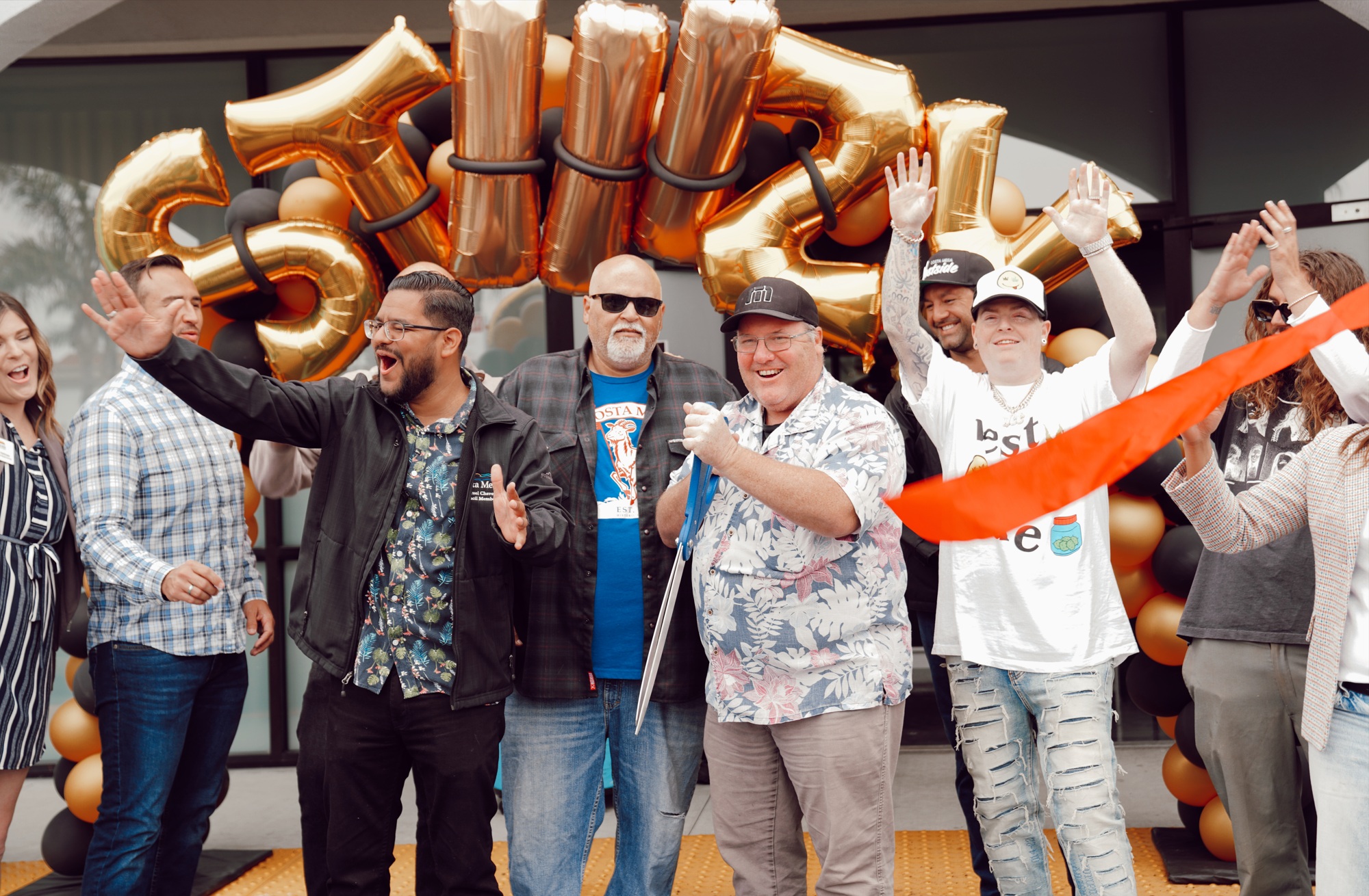 Ribbon cutting at the Costa Mesa grand opening